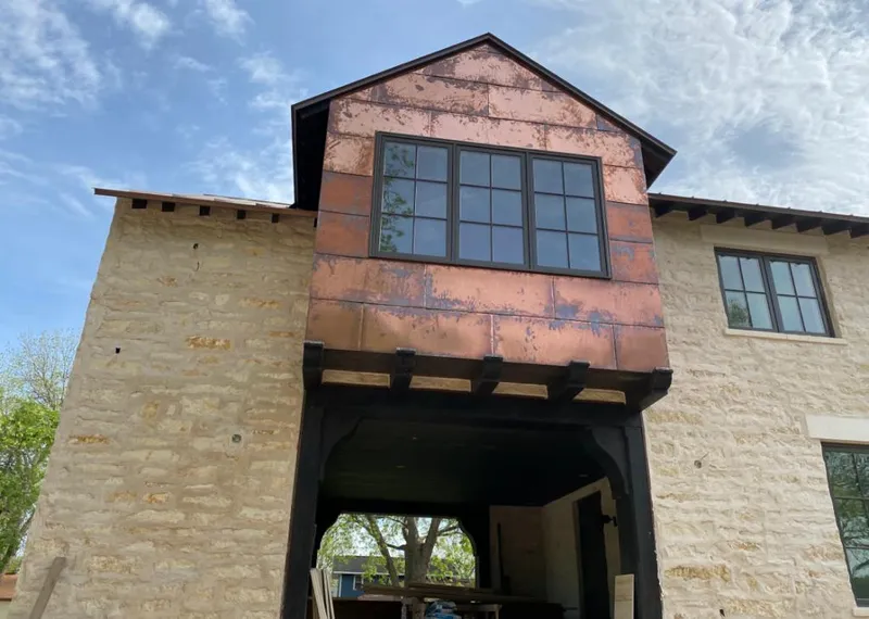 Copper metal panel facade on a stone building for Metal Roof Coating in Swoyersville